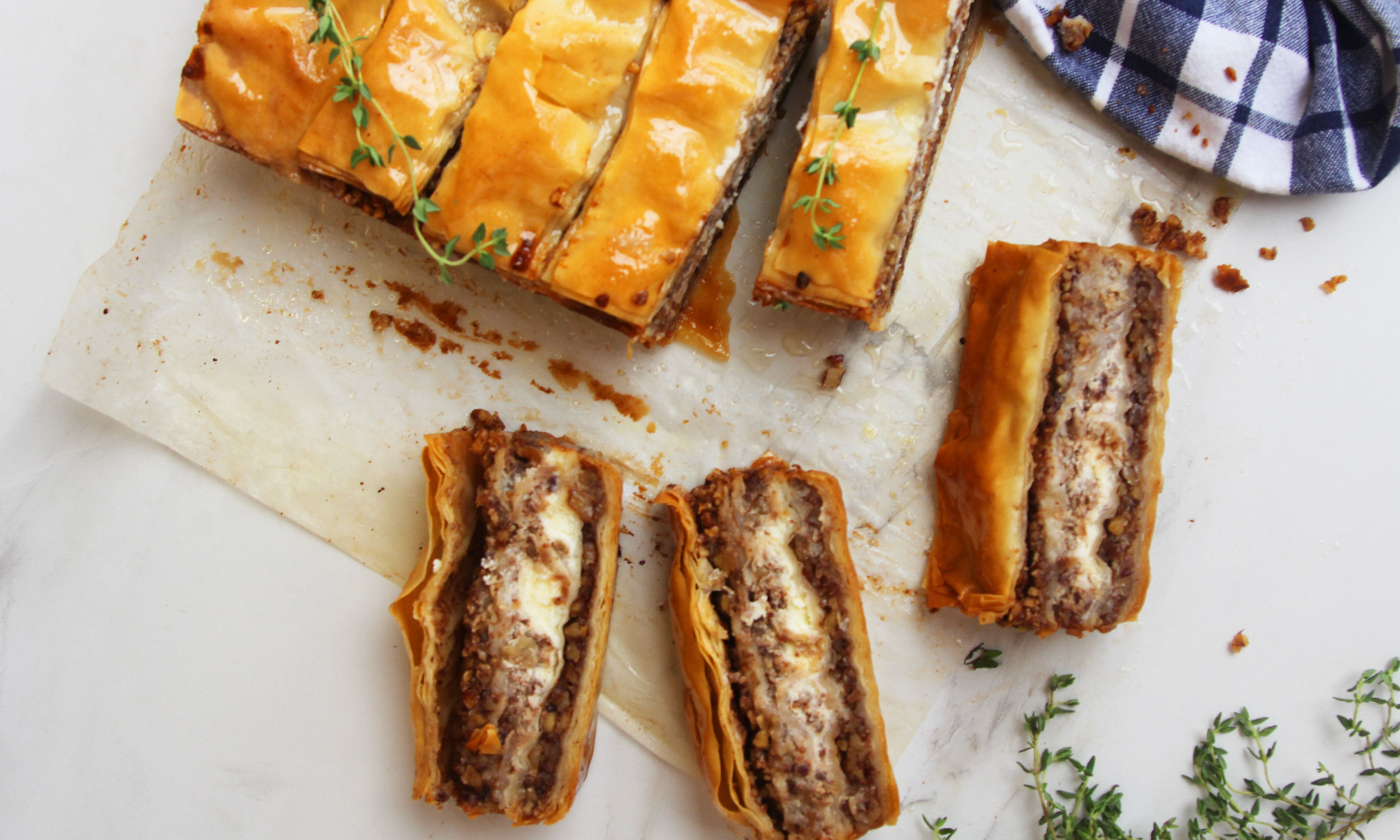 Pour Honey Thyme Syrup Over Your Cheesecake-Baklava Bars